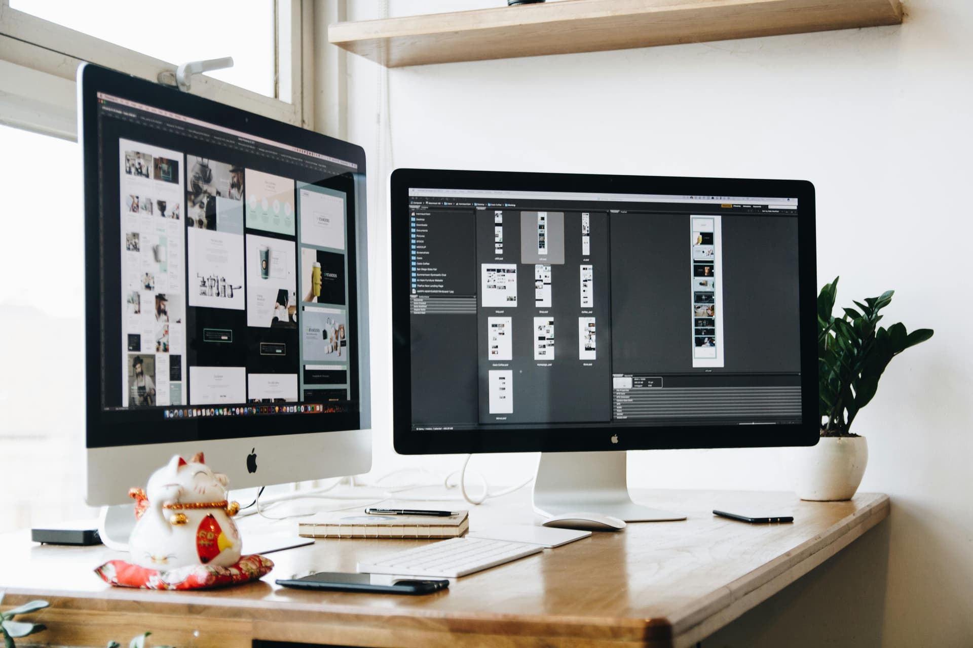 Two computer screens with graphics.